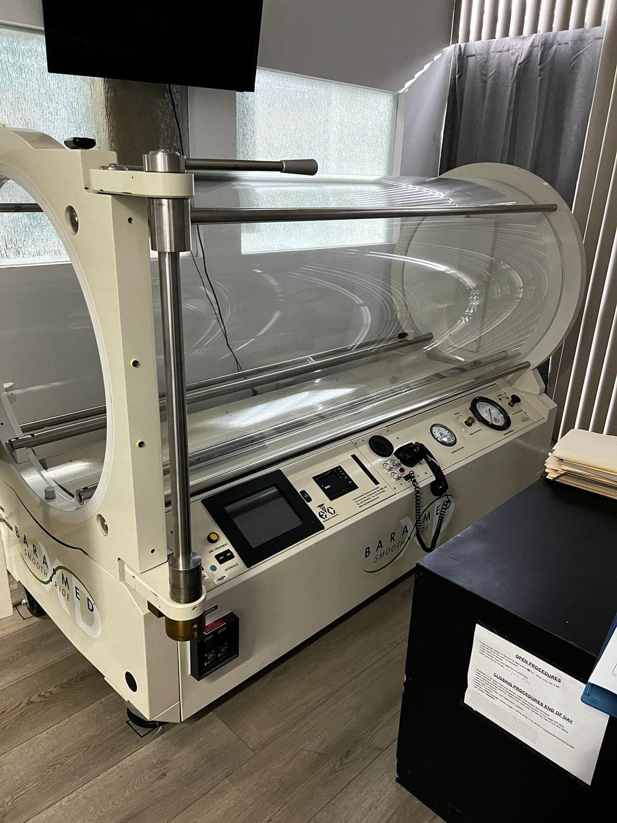 White medical-grade hyperbaric chamber at Pacific Hyperbarics — Oceanside